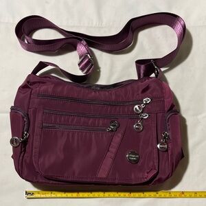 Elegant Plum Crossbody Bag by Travelon